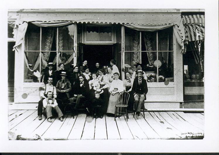 Mrs. Lymanstall operated a dressmaker’s shop on the north side of Main Street in what is the middle section of Fricano’s. Later Lymanstall’s would move to the south side of the street and have quite a scare when the fire of 1913 broke out.  Fortunately no loss was had.